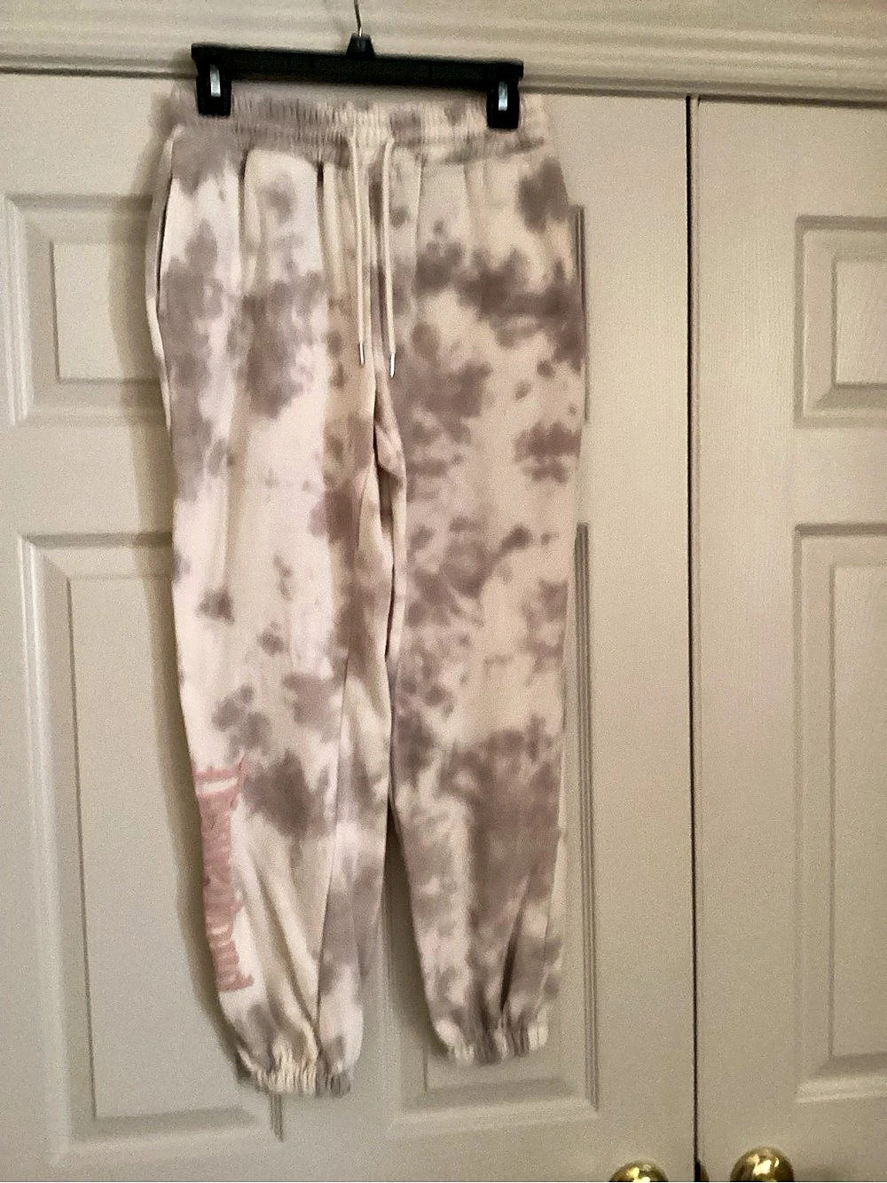 Disney matching tie-dye hoodie and jogger pants set.